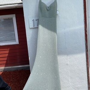 Beautiful sage, mermaid styled, and comfortable dress. Brand new & with tags